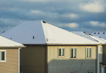 Midwest Homeowners’ Top Tips for Year-Round Home Upkeep midwest home with snow on roof