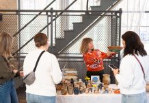 Sales + Events: April Celebrates Abundance Shoppers browse ceramics at the Mpls Craft Market
