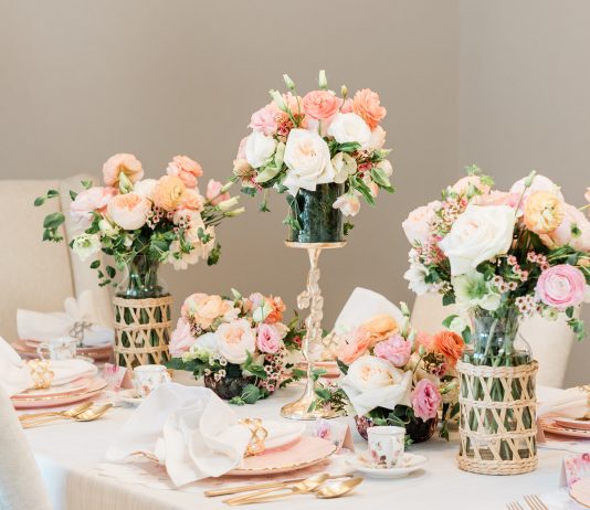 8 Expert Party Styling Tips for Spring Florals Varying heights and vessels add visual interest to floral arrangements at the dining table