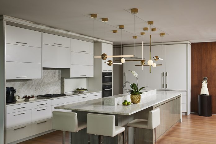 open concept kitchen with chandelier