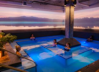 Inside Watershed Spa: How Design Details Enhance Well-Being To create the serene projections on the lower level, Rueckl tapped Watershed hypnotherapist Josh Sundby, who also happens to be an expert in digital signage. Sundby rotates images quarterly, often bringing Minnesota’s seasons indoors.