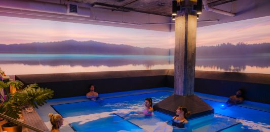 Inside Watershed Spa: How Design Details Enhance Well-Being To create the serene projections on the lower level, Rueckl tapped Watershed hypnotherapist Josh Sundby, who also happens to be an expert in digital signage. Sundby rotates images quarterly, often bringing Minnesota’s seasons indoors.