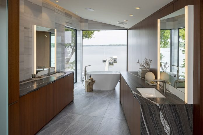 soaking tub overlooking lakeside window