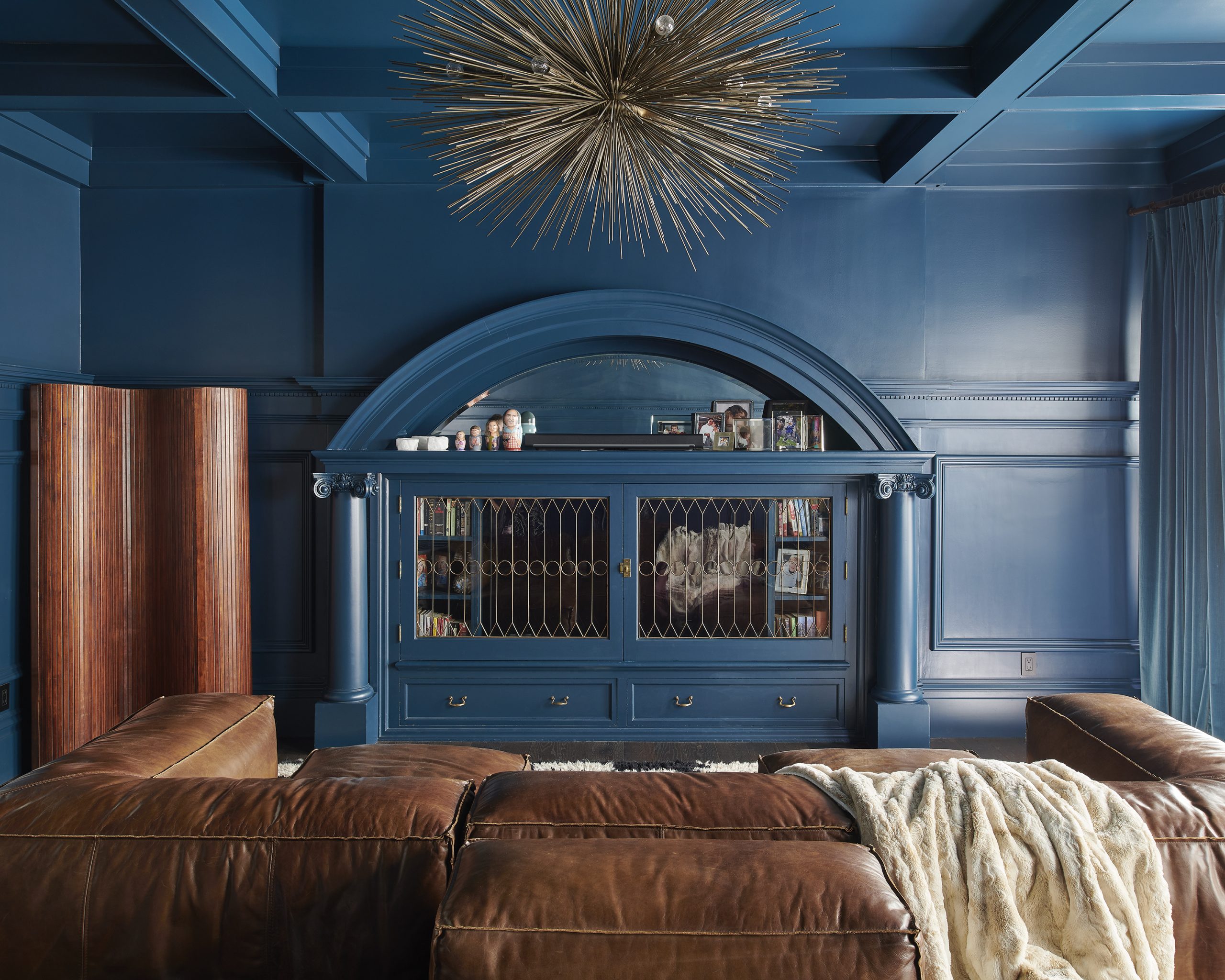 In this San Francisco home, Heather Peterson used vintage items of a similar era (1970s) and material. The tambour screen in the family room joins objects in other rooms to play against the more formal moldings.