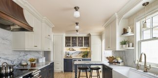 Functionality Shines in This Sophisticated Kitchen Remodel Hues of deep charcoal and creamy white pair with brass and heavily veined quartzite to create a space that brings color, texture, and visual details together. The Form From Form custom copper and brass hood is an especially showstopping piece.