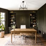 How to Thoughtfully Add Color to Your Interiors This home office by Willaby Way features Roycroft Bronze Green by Sherwin Williams to color drench the walls, millwork, and cabinetry.