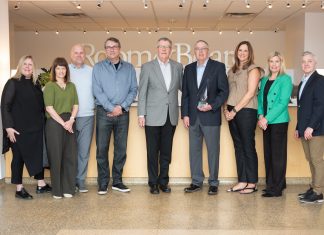 Room & Board Named Retailer of the Year by Home Furnishings Association Room & Board accepts the award for Retailer of the Year