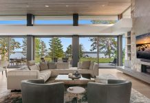 A Modern Park Rapids Lake Home Finds Inspiration in Nature The great room is a focal point of the home and provides easy flow into the kitchen and adjacent four-season porch. Sage-blue, hand-tied Tibetan rugs complement the wood flooring, ceiling, and natural stone fireplace.