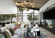 This Modern Minnesota Lake Home Is a Luxurious Sanctuary Natural light pours into the great room of this modern Minnesota lake home, complete with stunning lake views and sculptural lighting.