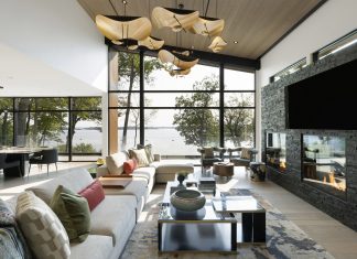 This Modern Minnesota Lake Home Is a Luxurious Sanctuary Natural light pours into the great room of this modern Minnesota lake home, complete with stunning lake views and sculptural lighting.