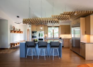 This Custom-Designed Ceiling Structure Is Artful and Inviting This ceiling structure brings warmth and artful function to this expansive, vaulted kitchen.