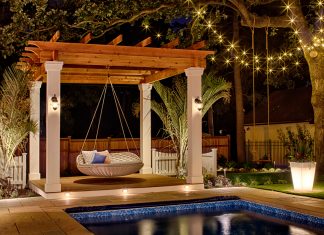 Just enough brightness, layered lighting, and comfy seating all create unique ambience for an unforgettable evening in the backyard—and this scene designed by Steve Schafer of Milow Outdoors proves it