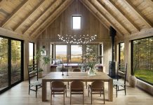 A Soulful Grand Marais Cabin The day bed in the bay window is a pinnacle of the design and a key family gathering spot, says Penfield. It’s spacious enough for the family to sit together, cozily. While seated, they can feel immersed in nature, and the cabin’s interior fades into the landscape.