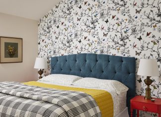 A Charming Guest Suite Leans into Color Schumacher wallpaper, a custom velvet headboard, and colorful nightstand make this guest suite stand out.