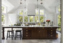 The Kitchen Steals the Show in This Expansive Orono Remodel The kitchen island came from an unexpected place: a piece of furniture the homeowners had been holding in storage for several years, hoping it could someday be used in their house. It was modified to be part of the island, and is now a standout feature of the room.