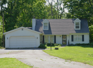 The Costly Mistake of Ignoring Early Warning Signs of Garage Door Opener Failure Exterior Home with Garage