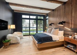 Industrial elements add intrigue to this primary bedroom