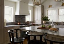 A 100-Year-Old Home Remodel Restores Its Charm The reimagined first floor includes an open-concept kitchen