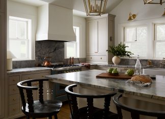 A 100-Year-Old Home Remodel Restores Its Charm The reimagined first floor includes an open-concept kitchen