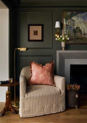 The refreshed living room in this historic remodel features saturated colors and rich character.