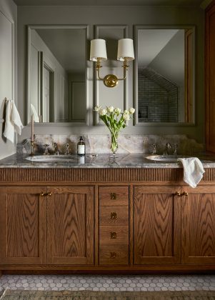 Character-rich details like this wood vanity are present throughout the home