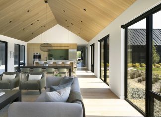 The home takes cues from European and Scandinavian farmhouses and is oriented to optimize daylight.
