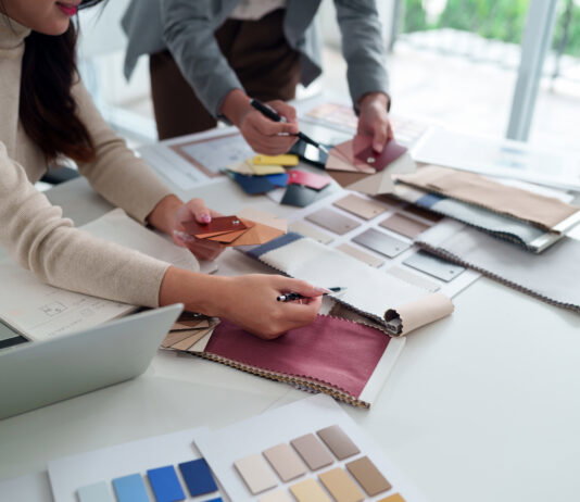 What Keeps You Inspired? 4 Designers Share Their Brain Busters Interior designer team working with fabric sample, color palette for home renovation project. Architect choosing material for building design. Collaboration on modern decor ideas