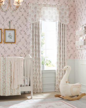 Rocking duck, curtains, and crib