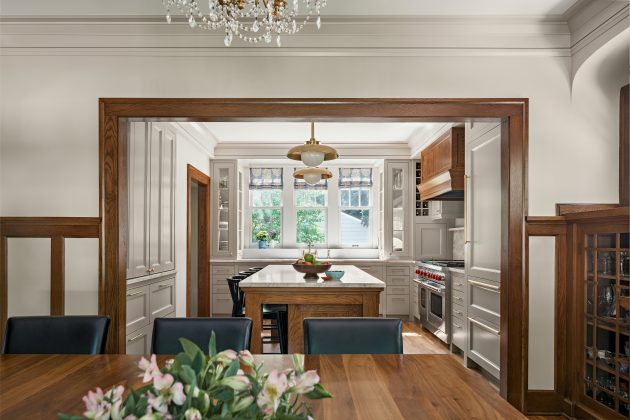 The dining room and kitchen feel more connected with the removal of a wall.