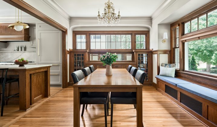 By removing the wall between the kitchen and dining room, flow between rooms is easier and gives the feeling of more space.