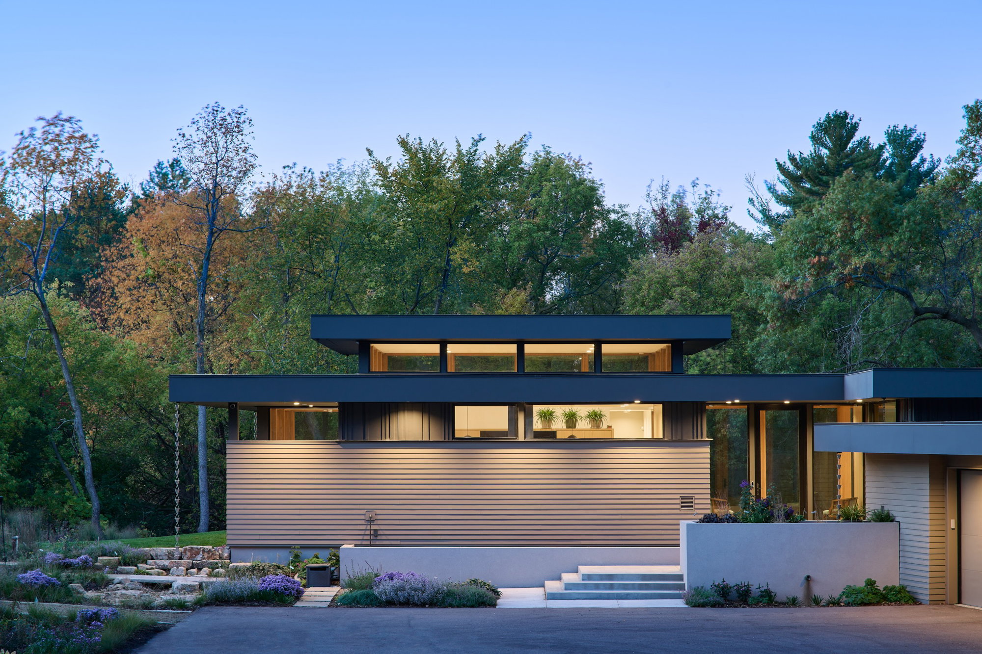Contemporary home project in Sunfish Lake by PLAAD