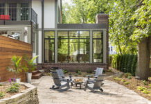 Want a Four-Season Sunroom? A Designer Shares Top Considerations for Homeowners Expansive windows bring the outdoors into this sunroom, which is awash in natural light and has clear views of the trees.