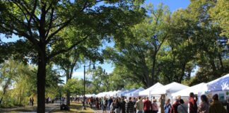 Line of tents at 2025 City of Lakes Art Fair