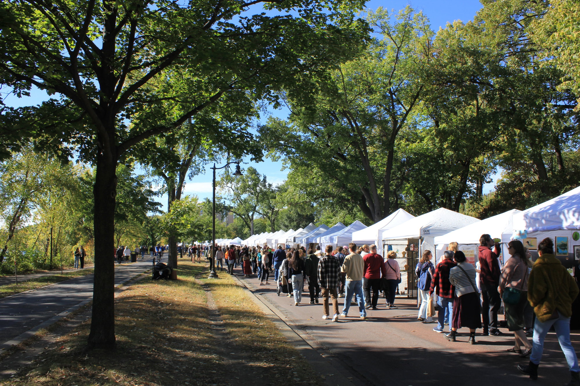 Line of tents at 2025 City of Lakes Art Fair