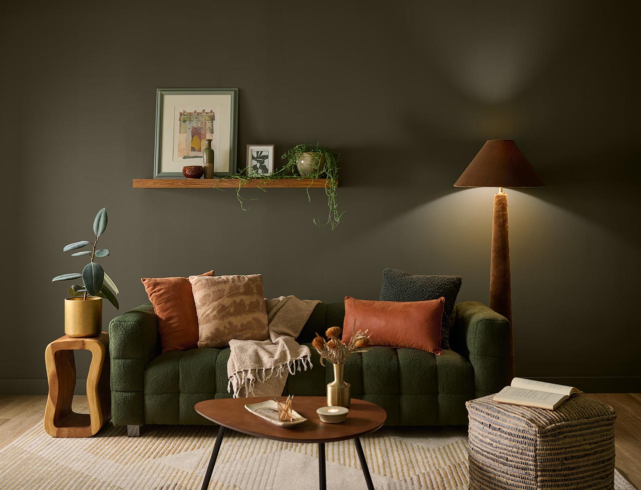 Behr Paint Co.'s 2027 color of the year selection, Grounded, a warm shade of green, adorns this living space. Sept. 2, 2026