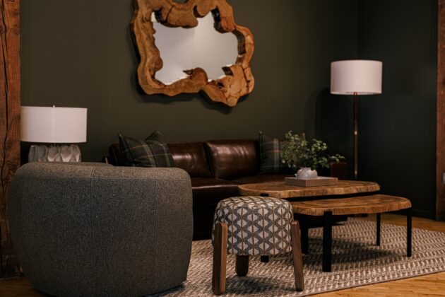 The front showroom spotlights custom pieces such as the Beck Mirror, the George Nesting Coffee Table, and the Oskar Stool; and also displays vendor partners like Made Goods, Currey & Co., and American Leather.