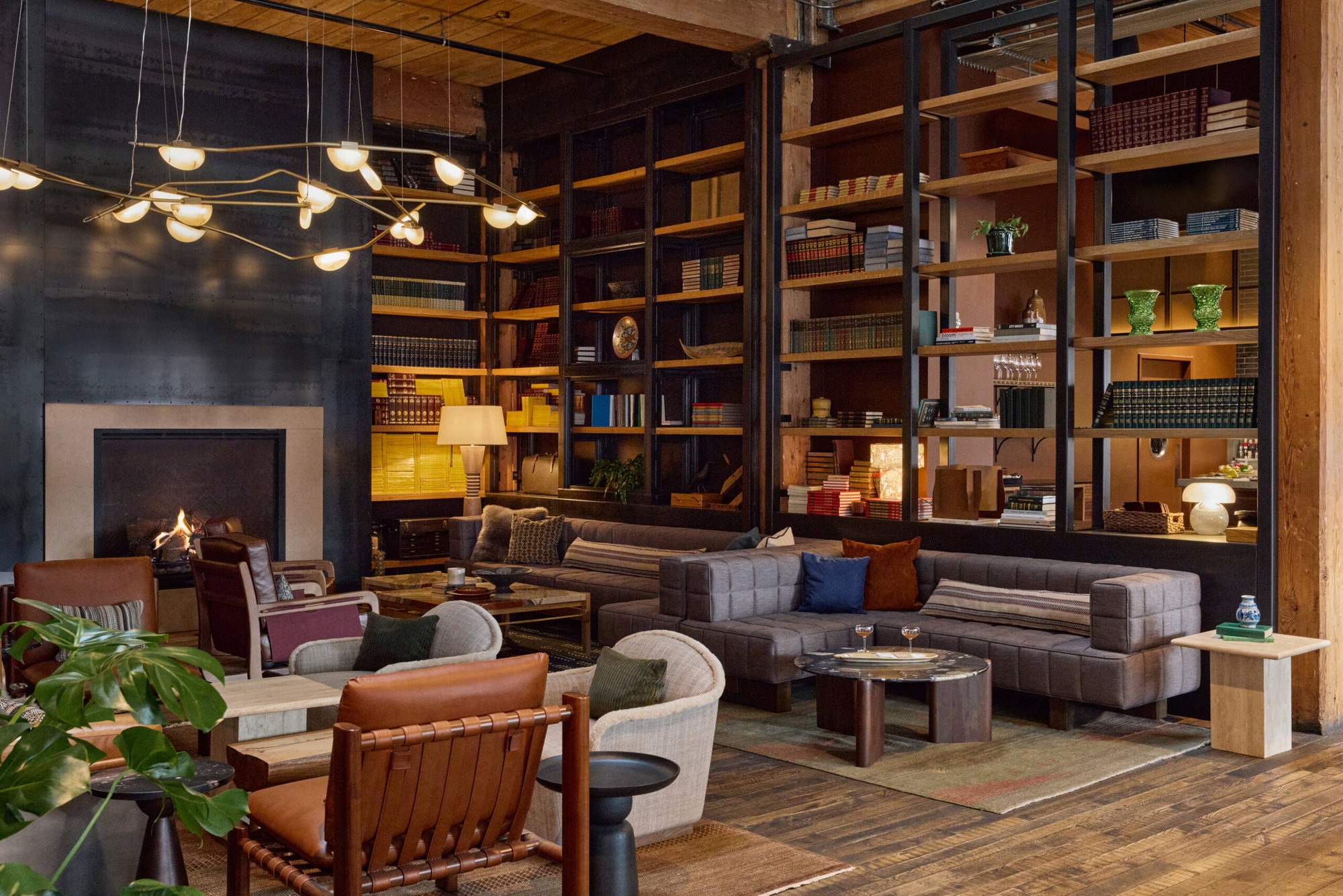 New furniture, fixtures, and rugs (plus some vintage rugs) and added greenery give the gathering areas on Hewing’s main floor a warm and inviting atmosphere, encouraging lounging and conversation.